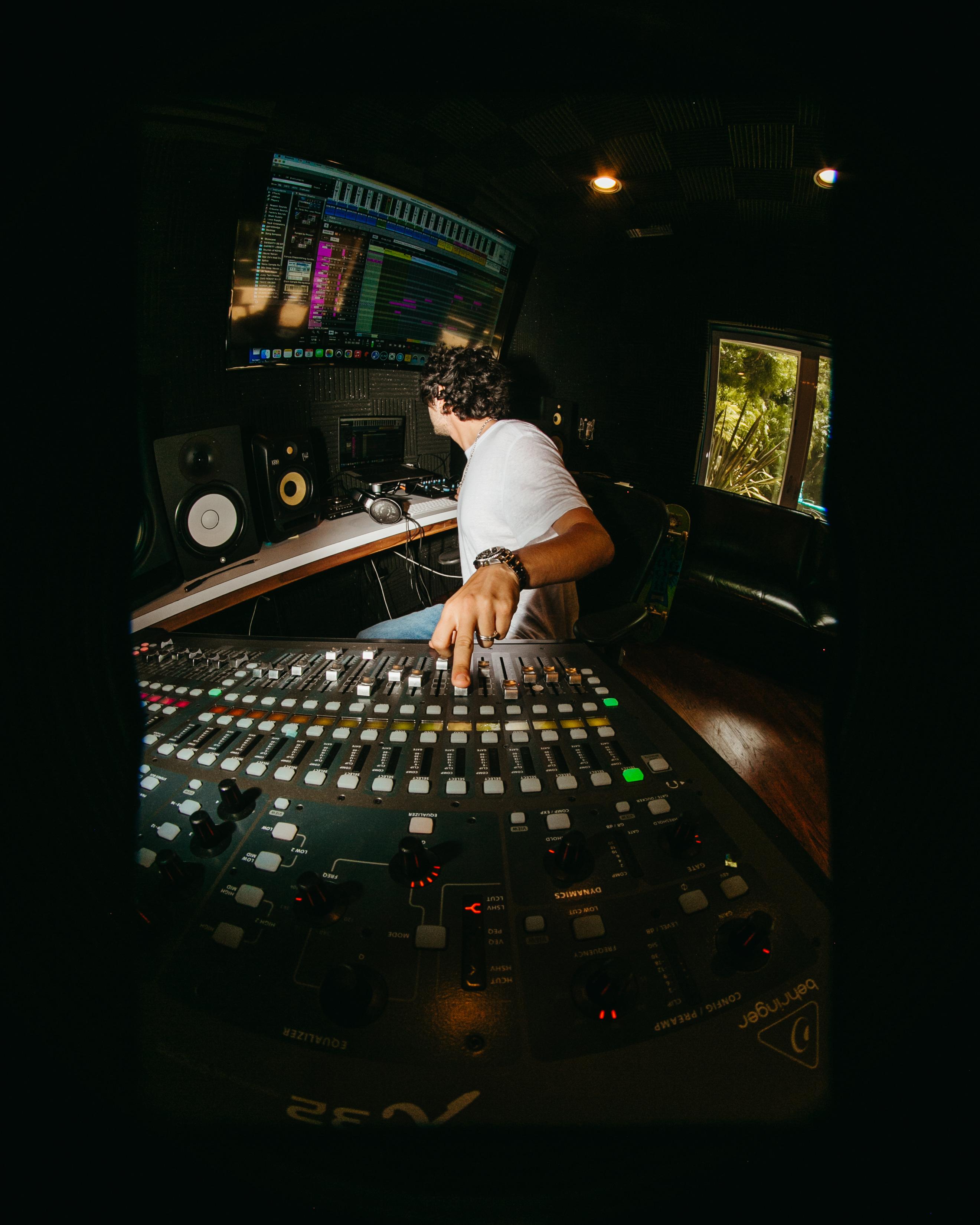 Garrett Lodge at the console in the studio